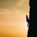 Adventure Travel: Rock Climbing in Railay Beach Thailand offers a diverse range of adventure travel experiences, from lush jungles and towering mountains to idyllic islands and vibrant cities. Railay Beach, located in Krabi Province, Thailand, is a world-renowned destination for rock climbing enthusiasts. It is a secluded paradise in southern Thailand offering a unique rock climbing experience for adventure travellers. With its stunning limestone cliffs, crystal-clear turquoise waters, and powdery white sand create a breathtaking backdrop for this adrenaline-pumping activity. Experiences Scaling Vertical Rock Faces As the traveller ascends the towering limestone cliffs, he is met with a thrilling challenge that tests his physical prowess and mental focus. With each upward movement, he discovers hidden caves and scenic viewpoints that offer breathtaking vistas of the surrounding landscape. The rock face, with its intricate textures and formations, provides a unique and exhilarating experience, allowing him to push beyond his limits and achieve a sense of accomplishment. Challenging Routes for All Skill Levels The rock climbing routes in Railay Beach cater to adventurers of all skill levels, from novice climbers to seasoned experts. Beginners can start with easier routes, gradually building their confidence and skills, while experienced climbers can tackle more challenging ascents, pushing their limits and refining their techniques. With each route offering a unique set of obstacles and opportunities, climbers can choose their own path and pace, ensuring an experience that is both thrilling and rewarding. Stunning Scenery and Turquoise Ocean As the adventurer climbs higher, he is treated to a visual feast of stunning scenery, with the turquoise ocean stretching out before him and the surrounding islands rising from the sea like emerald giants. The contrast between the rugged rock face and the serene ocean creates a sense of harmony and balance, inspiring a deep appreciation for the natural world. With each upward glance, he is reminded of the beauty and majesty of this tropical haven, and the sense of wonder that it inspires. Relaxing on the Beach After a day of climbing, the adventurer can unwind and relax on the beach, soaking up the tranquillity of this tropical haven. The soft sand, warm sun, and gentle lapping of the waves against the shore create a sense of calm and serenity, washing away the fatigue and stress of the climb. As he gazes at the ocean, he can reflect on his accomplishments and experiences, feeling grateful for the opportunity to connect with nature and challenge himself in this beautiful and inspiring setting. A few Tips that would be helpful When venturing into the breathtaking world of rock climbing in Railay Beach, it is essential to be well-prepared and informed to ensure a safe and unforgettable experience. Whether one is a seasoned climber or a novice adventurer, these expert tips will guide one in navigating the challenges and wonders of this tropical haven. From hiring certified guides to respecting the environment, and from choosing the right gear to combining climbing with other activities, these valuable insights will help one to maximise the thrill of adventure and create lifelong memories amidst the stunning scenery and turquoise ocean of Railay Beach. Hiring a Certified Guide or Joining a Reputable Tour - To ensure a safe and enjoyable rock climbing experience in Railay Beach, it is highly recommended that adventurers hire a certified guide or join a reputable tour. A certified guide possesses the necessary expertise and knowledge to lead climbers through the most suitable routes, provide instruction on proper climbing techniques, and ensure that all safety protocols are followed. Joining a reputable tour also offers the benefit of logistical support, equipment rental, and access to local knowledge, allowing climbers to focus on their adventure. Bringing Necessary Gear - Climbers should bring the necessary gear to ensure a safe and successful climb. This includes climbing shoes, which provide the necessary support and traction, a harness, which allows for secure attachment to the rope, and a chalk bag, which helps maintain grip on the rock face. Additionally, climbers should consider bringing other essential items such as water, snacks, and sun protection. By bringing the necessary gear, climbers can ensure that they are well-prepared for their adventure and can focus on enjoying the experience. Fitness: Climbers should ensure that they are in good physical condition. Some routes can be physically demanding. Hydration and Sun Protection: It is advisable to take along plenty of water, sunscreen, and a hat. The sun can be intense, especially during midday. Being Mindful of the Environment and Respecting Local Regulations - As climbers explore the beauty of Railay Beach, they must be mindful of the environment and respect local regulations. This includes minimizing waste, avoiding damage to the rock face and surrounding vegetation, and adhering to any rules or guidelines set by local authorities. By being responsible and respectful, climbers can help preserve the natural beauty of the area for future generations to enjoy. Combining Climbing with Other Activities - To experience a well-rounded adventure in Railay Beach, climbers may consider combining rock climbing with other activities such as kayaking or snorkelling. This allows for a more diverse experience, taking advantage of the area's unique natural features. Kayaking offers a chance to explore the surrounding islands and marine life, while snorkelling provides an opportunity to discover the underwater world. By combining activities, climbers can create a more comprehensive and memorable adventure. Additional Experiences in Railay Beach Kayaking: Travellers can explore the coastline and nearby islands by kayak. Snorkelling and Diving: Travellers can discover the underwater world around Railay. Hiking: Visit the Railay Viewpoint and the Princess Lagoon for breathtaking views. Thai Cooking Class: Learn to cook traditional Thai dishes. Yoga: Join a beachside yoga class for relaxation and stretching after climbing. Highlights of Rock Climbing in Railay Beach Climbing Spots Ton Sai Beach: Known for its challenging routes and vibrant climber community. Phra Nang Beach: Offers beautiful views and a range of climbing routes. Railay West and East: Numerous climbing spots with varying difficulty levels. Routes and Grades Beginners: Routes graded 5a to 6a, ideal for those new to climbing. Intermediate: Routes graded 6a+ to 7a, for climbers with some experience. Advanced: Routes graded 7a+ and above, offering technical challenges. Conclusion Rock Climbing Keywords used luxury concierge concierge luxury travel Luxury Lifestyle Concierge Services Reference links used https://www.tripadvisor.in/Attractions-g1597036-Activities-c61-t215-Railay_Beach_Krabi_Town_Krabi_Province.html https://karstclimbingkrabi.com/half-day-climbing-trip/#:~:text=FUN%20CLIMBING%20%7C%20Half%2Dday%20Group%20Climbing%20Trip%20at%20Railay%20Beach&text=The%20abundance%20of%20easily%20accessible,routes%20Railay%20has%20to%20offer. https://www.tripadvisor.in/Attraction_Review-g1597036-d2370984-Reviews-Railay_Rock_Climbing-Railay_Beach_Krabi_Town_Krabi_Province.html https://www.viator.com/en-IN/tours/Krabi/Rock-Climbing-at-Railay-Beach-Krabi/d348-110534P13 https://in.trip.com/things-to-do/detail/17940077/ https://www.explore-share.com/rock-climbing-trips/thailand/railay-beach/